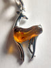 11.4ct AMBER DEER PENDANT SET IN SILVER