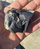 137.8 G. EJECTA MELT, FUSION CRUSTED LIMESTONE