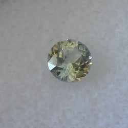 .65CTS. OLIVE GREEN WITH GOLDEN HIGHLIGHTS MONTANA SAPPHIRE - Blaze-N-Gems