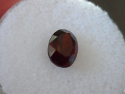 1.60 CTS. FANCY OVAL CUT DARK RED/ORANGE MONTANA GARNET - Blaze-N-Gems